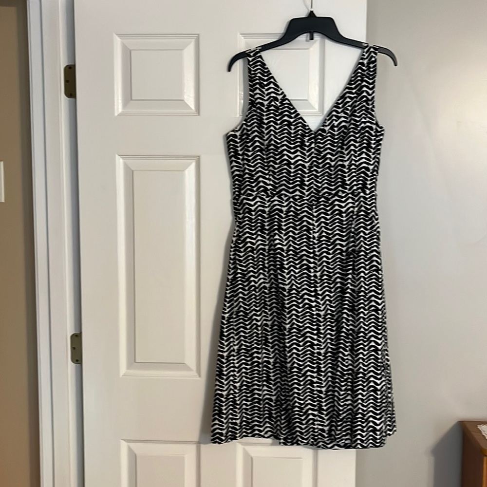 Ladies dress. 14W. Very good condition with a little white staining under arms.